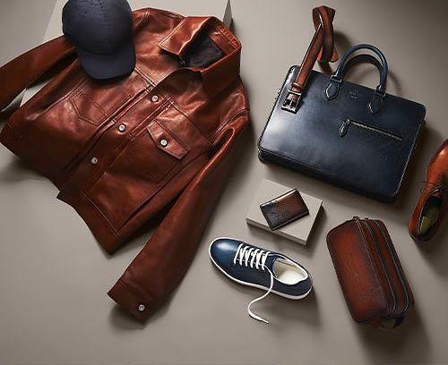 Collections Berluti : Blouson, Sneakers, Porte-cartes, Trousse de toilette, Mallette, Ceinture, Richelieu, Casquette