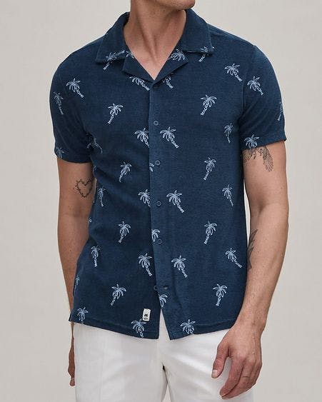 male model in palm tree printed sport shirt