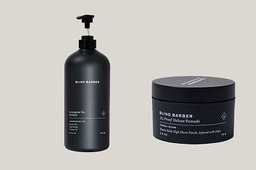 two Blind Barber grooming products displayed on grey backdrop