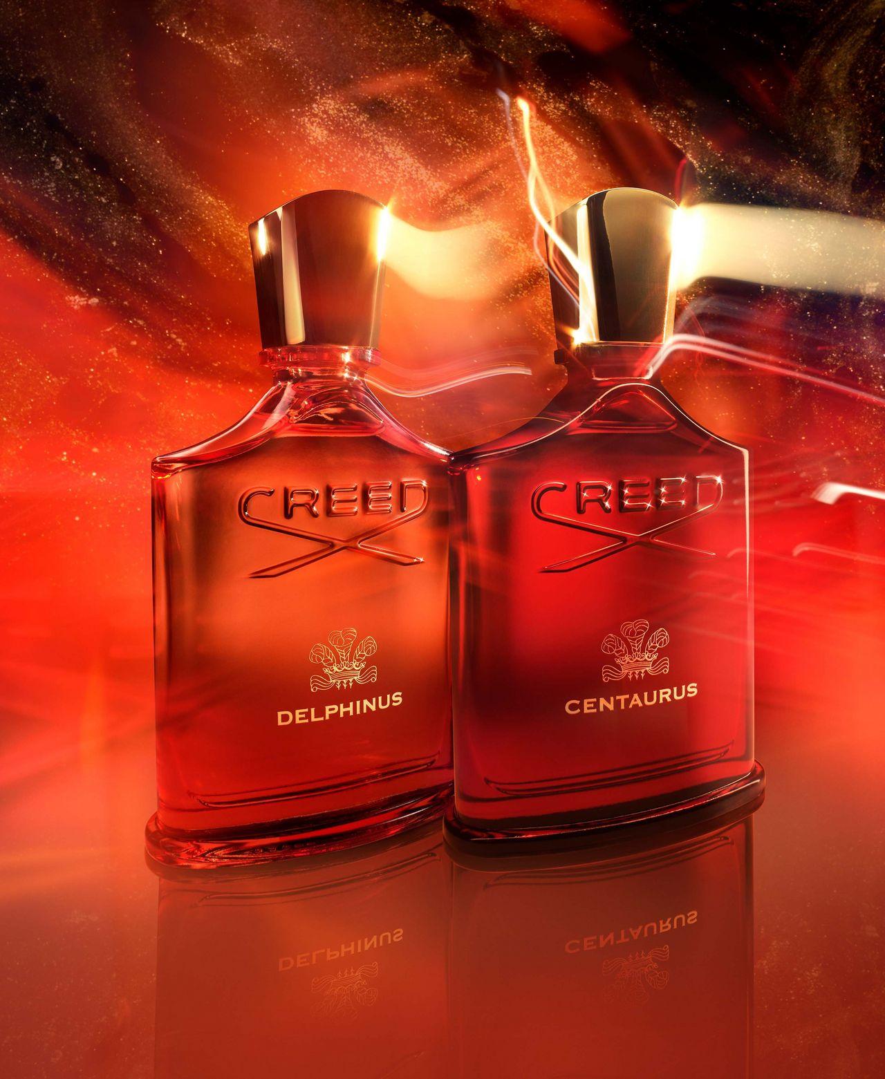 two Creed perfume bottles