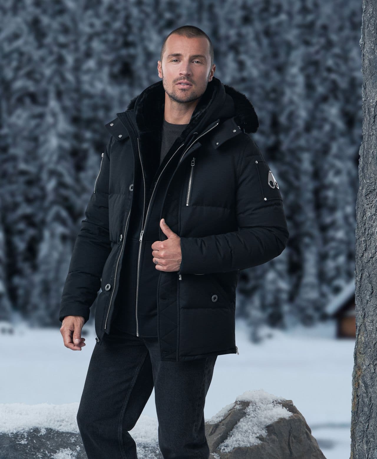 Male model wearing Moose Knuckles parka