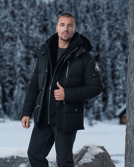 Male model wearing Moose Knuckles parka